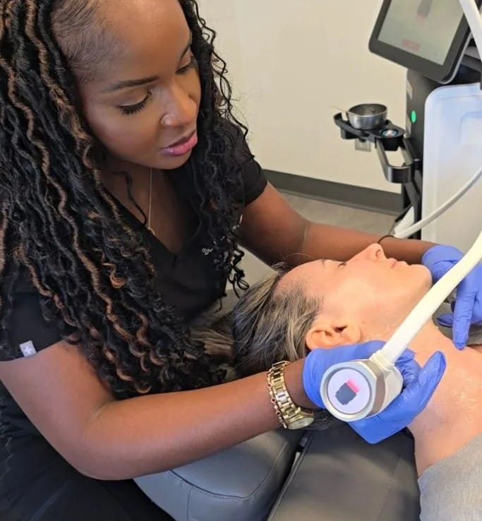 Dr Lian performing Xerf facial treatment on female patient at Dr. Lian Beauty Clinic in Limoges, Eastern Onatrio