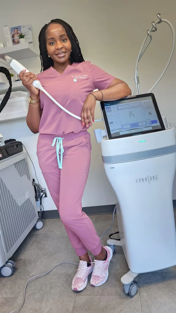 Dr. Lian Peter posing beside the Cynosure Potenza rf Microneedling device